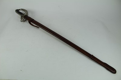 Lot 880 - Scarce Victorian 1895 Pattern infantry officers Sword with pierced hilt with crowned VR cipher, wire bound fish skin grip, etched blade retaining a good amount of original polish, in brown pig skin...