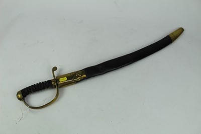 Lot 881 - Victorian Customs / Police Short Sword / Cutlass with curved fullered steel blade, brass hilt with ribbed grip, in brass mounted leather scabbard, blade 61cm in length.