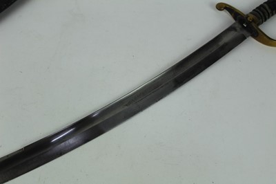 Lot 881 - Victorian Customs / Police Short Sword / Cutlass with curved fullered steel blade, brass hilt with ribbed grip, in brass mounted leather scabbard, blade 61cm in length.