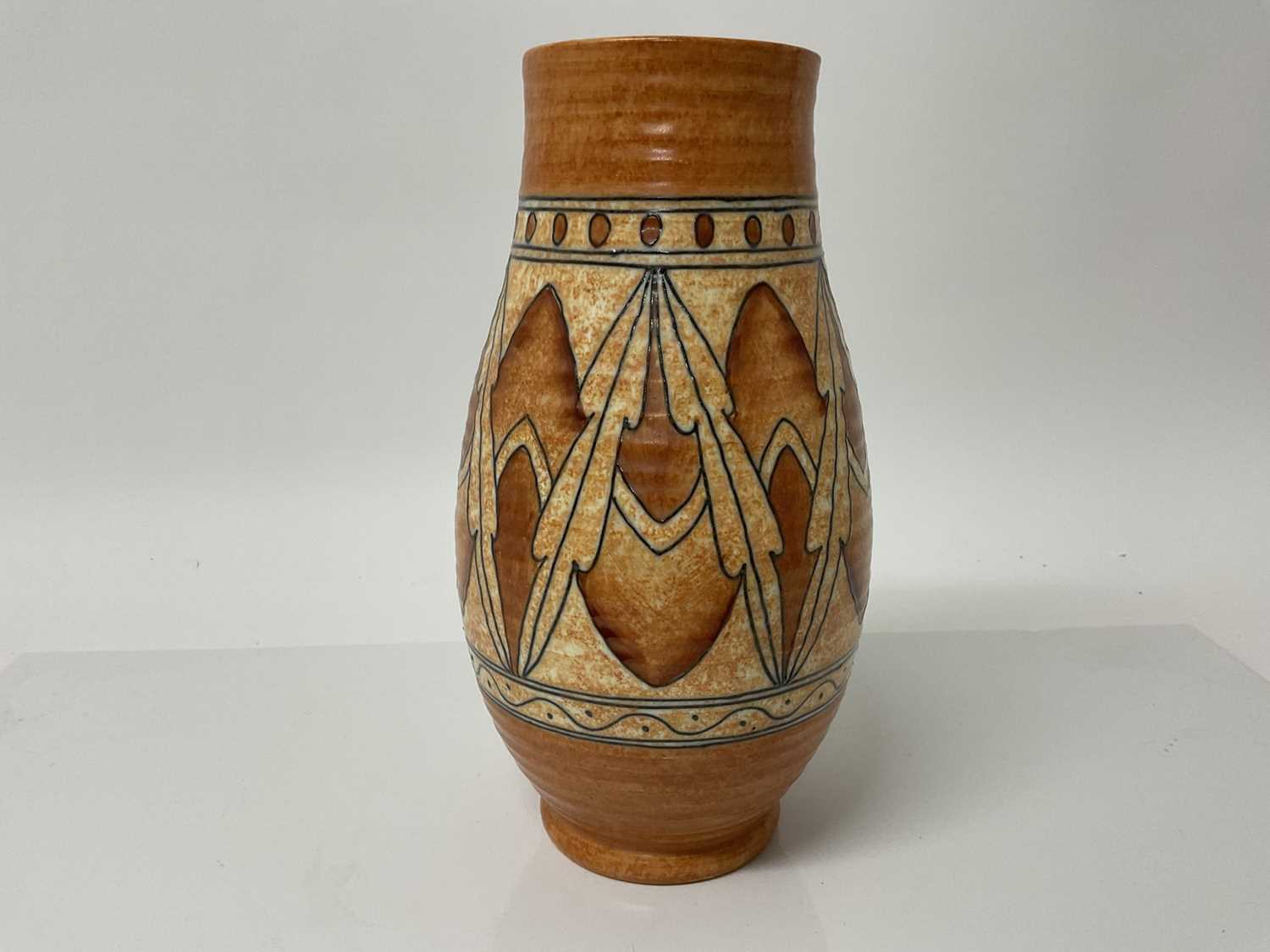 Lot 1119 - Charlotte Rhead Crown Ducal orange and brown vase, signed, 26cm high