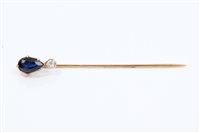 Lot 783 - Sapphire and diamond stick pin, the pear cut...