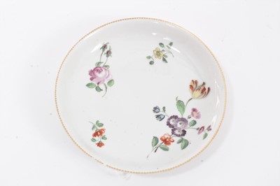 Lot 259 - A Chelsea saucer, painted with flowers, circa 1765-70