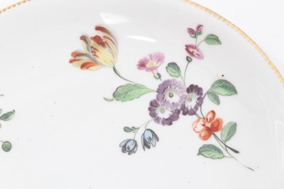 Lot 259 - A Chelsea saucer, painted with flowers, circa 1765-70