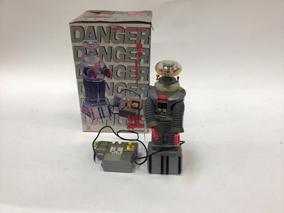Lot 1878 - Selection of Children's computer and board games including Sinitron Space Invaders, Stylophone, Grand Stand Video Entertainment Center and others. In six boxes.