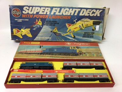 Lot 1933 - Three boxes of children's toys including teddy bear, railway, die cast models and others.