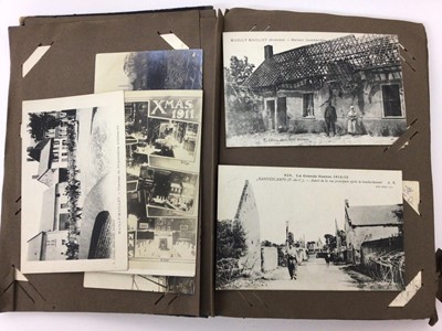 Lot 1428 - Postcards in album Military cards including WW1 Silk Embroidered Cards (13), real photographic Bridge Building Chatham, Xmas 1911 Multiview Brompton Barracks, WW1 French cards including Street Scen...