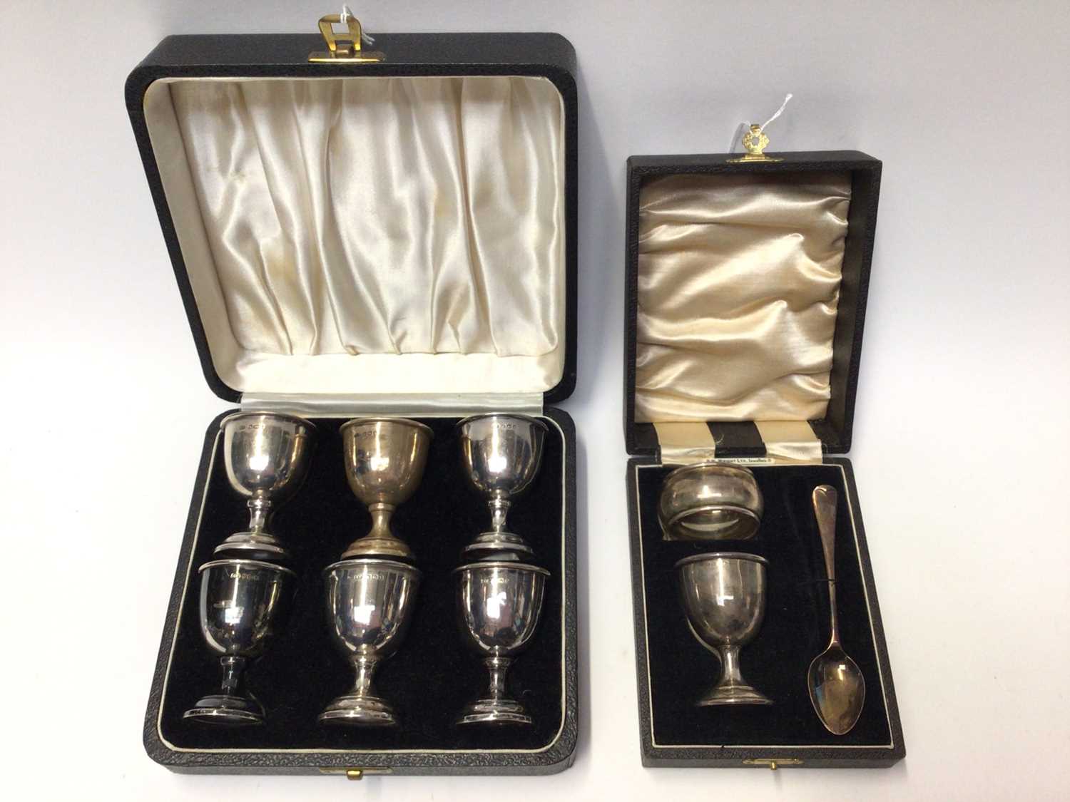Lot 129 - Set six silver egg cups and silver Christening set, both in fitted cases
