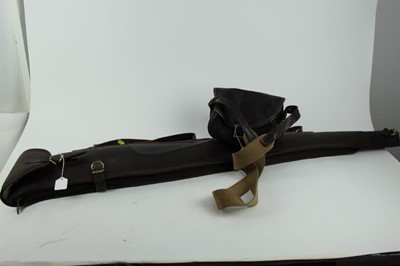 Lot 923 - Good quality leather gun slip by John Shooter, together with a cartridge bag (2)