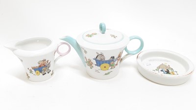 Lot 1179 - Shelley Mable Lucie Attwell teapot decorated with pixies together with a milk jug and a babies bowl (3)