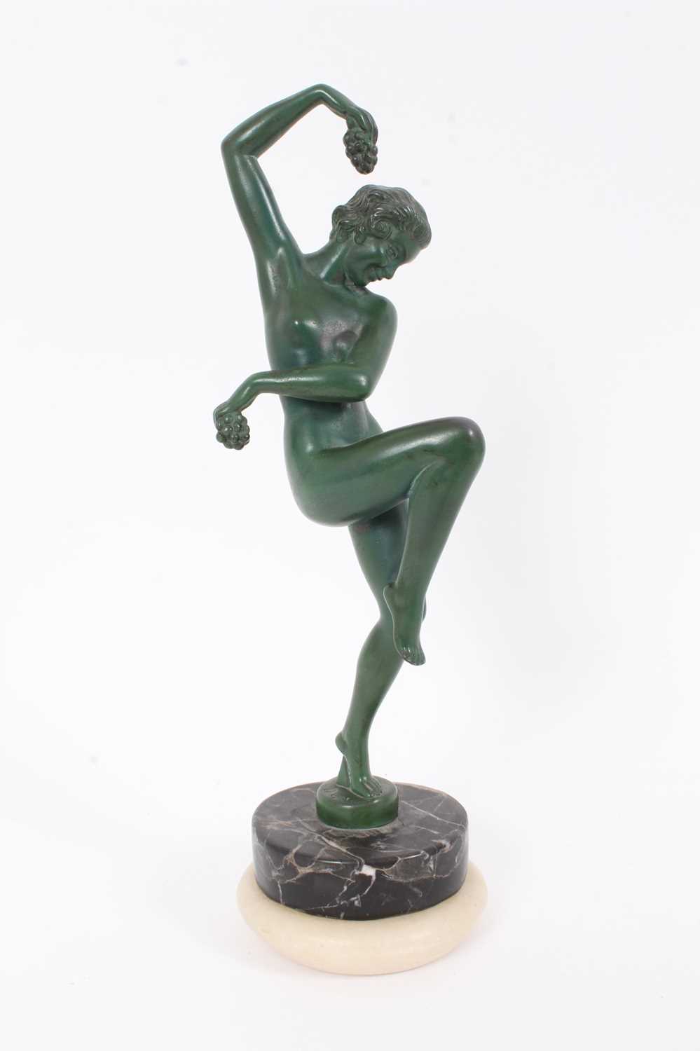 Lot 2525 - Art Deco green-patinated metal figure of a nude woman dancing, on marble base, signed 'Denis' and 'Made in France' to base, possibly designed by Max Le Verrier, 27cm high