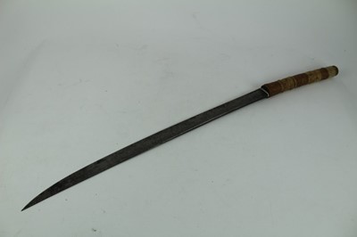 Lot 863 - Eastern sword with rope bound bamboo grip, steel blade stamped X20 in wooden scabbard, blade 63cm in length
