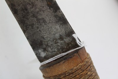 Lot 863 - Eastern sword with rope bound bamboo grip, steel blade stamped X20 in wooden scabbard, blade 63cm in length
