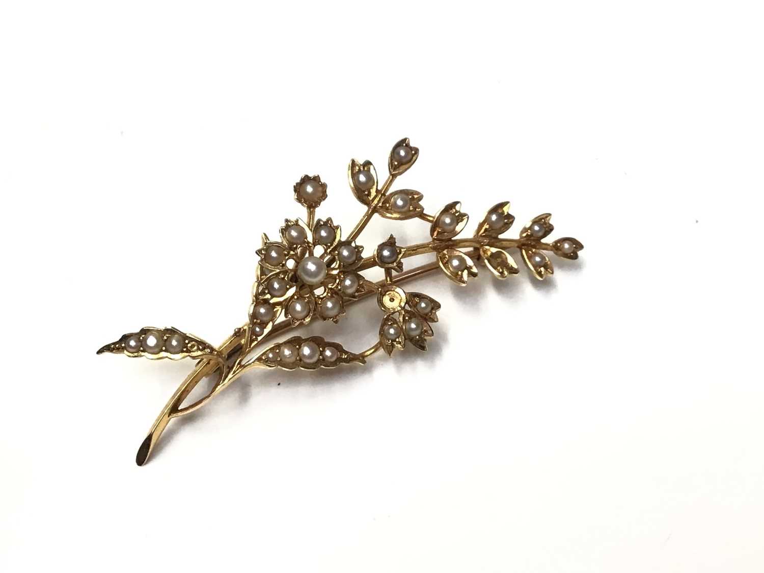 Lot 152 - Victorian 15ct gold seed pearl floral spray brooch
