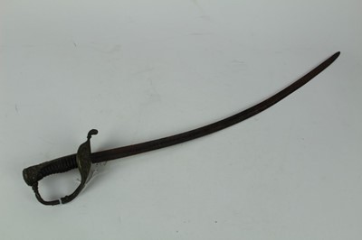 Lot 865 - French children's / practise sword with ribbed wooden grip, brass pommel and guard, with curved steel blade, 54.5cm overall length.