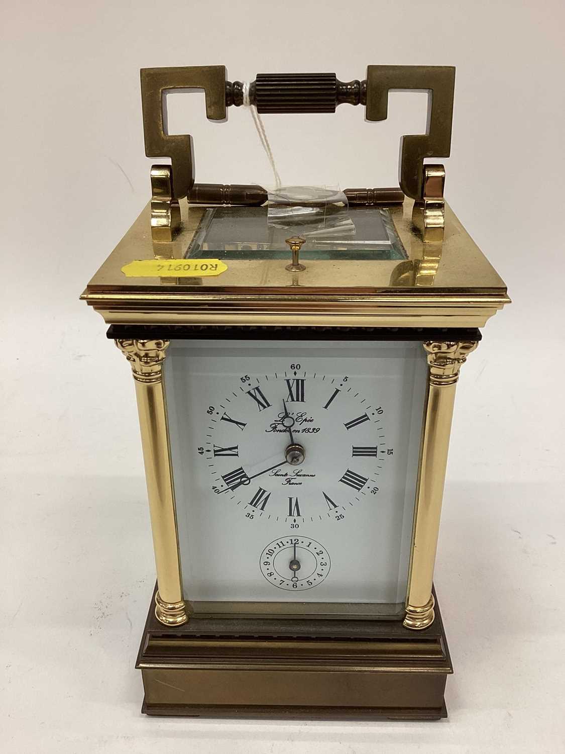 Lot 2559 Large brass cased carriage clock and key