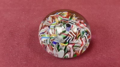 Lot 1091 - 19th century French scrambled cane paperweight