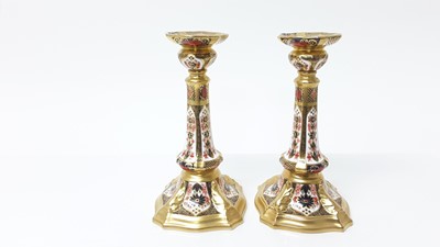 Lot 1204 - Pair of Royal Crown Derby Imari candlesticks, pattern no 1128, boxed