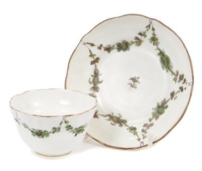 Lot 197 - 18th century Bristol style tea bowl and saucer