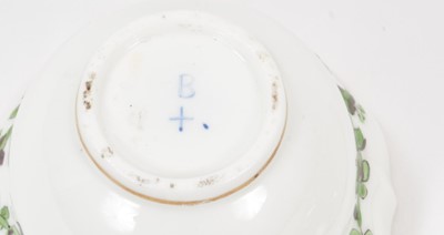 Lot 197 - 18th century Bristol style tea bowl and saucer