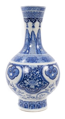 Lot 202 - A Chinese blue and white vase with styalised leaf, floral and dragon decoration