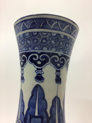 Lot 202 - A Chinese blue and white vase with styalised leaf, floral and dragon decoration