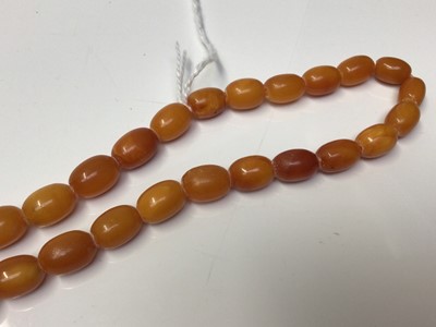 Lot 171 - Vintage amber necklace with a string of graduated butterscotch amber beads