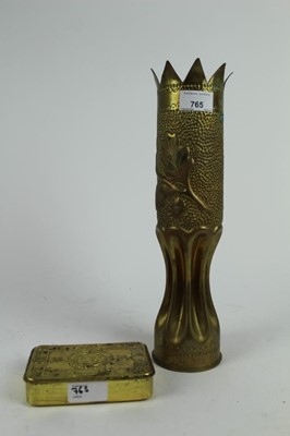 Lot 765 - First World War Princess Mary gift tin, together with a First World War brass trench art shell case vase, 34.5cm in height (2)