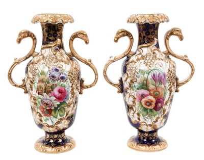 Lot 218 - Pair Early 19th century English porcelain two handled vases, painted with flowers, on a blue ground, circa 1825