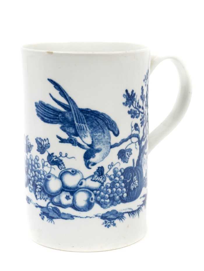 Lot 208 - 18th century Worcester blue printed Parrot Pecking Fruit pattern mug, circa 1770