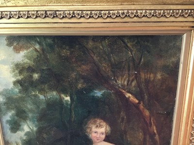 Lot 88 - English School circa 1850 oil on canvas - A young girl with her pet dog in woodland in gilt frame