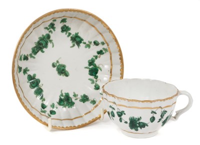 Lot 239 - 18th century Bristol tea cup and saucer, decorated in green monochrome, circa 1775