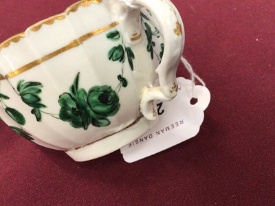 Lot 239 - 18th century Bristol tea cup and saucer, decorated in green monochrome, circa 1775