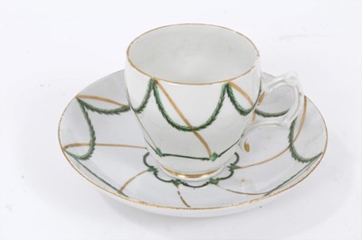 Lot 244 - 18th century Bristol ogee shaped coffee cup and saucer, decorated in green and gilt, circa 1775