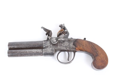 Lot 895 - Early 19th century Flintlock double barrelled over and under pocket pistol with tap action, turn off barrels, Leeds retailer, steel frame with walnut slab sided grip 20.5 cm overall