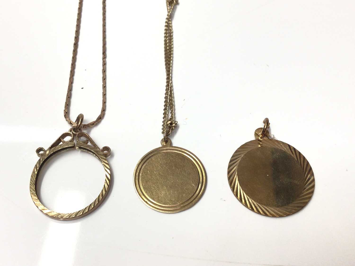Lot 180 - 9ct gold coin mount on chain, two 9ct gold disc pendants, one on 9ct gold chain