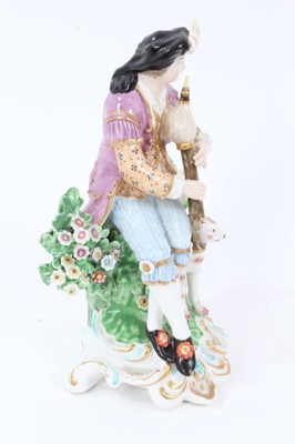 Lot 253 - Derby figure of a shepherd playing a pipe, circa 1815-20