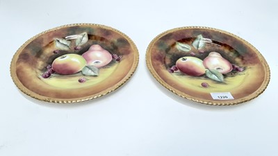 Lot 1220 - Pair of Baroness China fruit pattern plates, signed R Everill, 26cm diameter