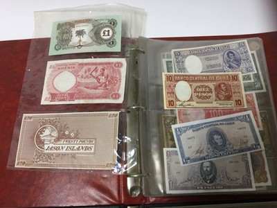 Lot 503 - World - Mixed banknotes to include issues from China, Germany, Japan, Russia and others, in two folders (122 banknotes)