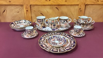 Lot 1222 - Selection of Royal Crown Derby Imari items to include coffee cans, milk jug, shaped tray, teacups, plate etc, various patterns including 2451, 6149, 2614 and 1128 - 16 pieces