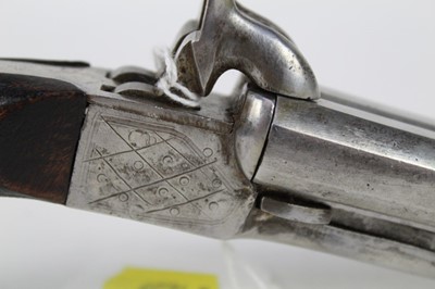 Lot 905 - Late 19th century Continental  Percussion Pinfire double barrelled over coat pistol with octagonal barrels and concealed triggers.22 cm overall.