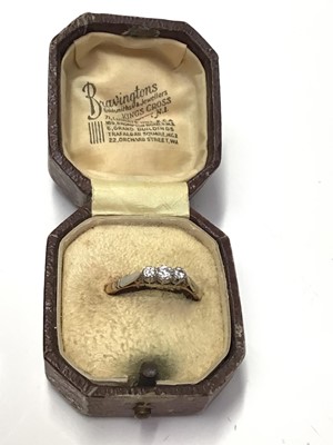 Lot 278 - Diamond three stone ring in platinum claw setting on 18ct yellow gold shank