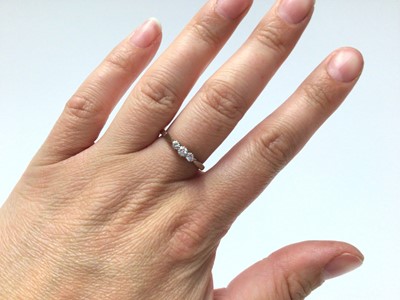 Lot 278 - Diamond three stone ring in platinum claw setting on 18ct yellow gold shank
