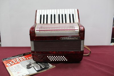 Lot 2215 - Worldmaster accordion in case