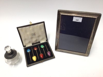 Lot 197 - Silver photograph frame, set six enamelled silver coffee spoons in fitted case and silver mounted glass scent bottle
