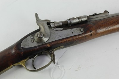 Lot 911 - Victorian Snider rifle, the lock with crowned VR cipher and '1871 Enfield', ordnance stamps to barrel, walnut stocked with brass mounts and steel ramrod.