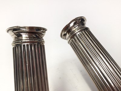 Lot 202 - Pair Victorian silver column candlesticks (London 1898)