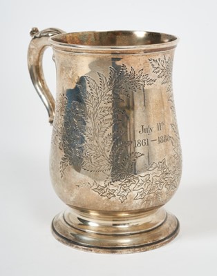 Lot 337 - Victorian silver mug of baluster form, with engraved fern leaf decoration