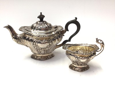 Lot 207 - Edwardian silver bachelors teapot and matching milk jug (Birmingham 1906)