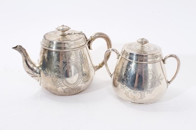 Lot 339 - Victorian silver tea pot of tapering cylindrical form with engraved Gothic style decoration