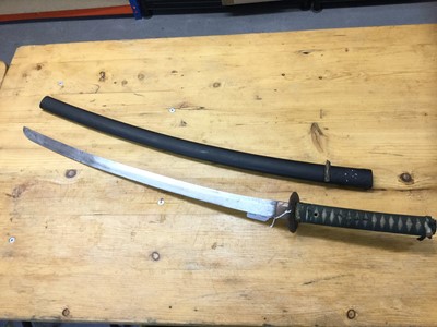 Lot 878 - Japanese Katana with iron tsuba and curved steel blade, 63cm in length. 85cm in overall length.